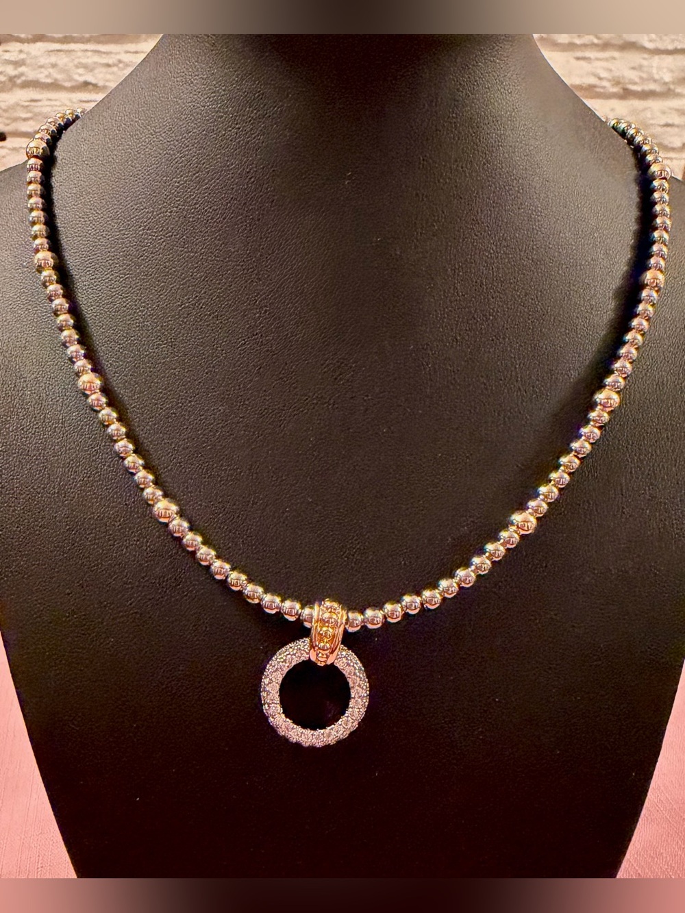 Silver & Gold 2-toned beaded necklace & 
circle Pendant with crystals.